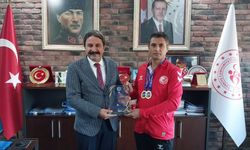 Şampiyon sporcu Kalın ile bir araya geldi