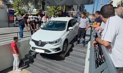 Kütahya'da markete girecekti, merdivenlerde asılı kaldı