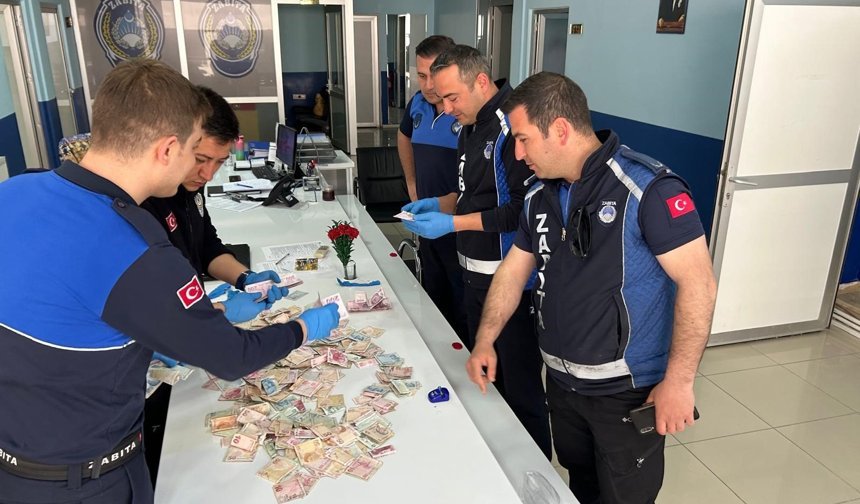 Dilencinin üzerinden çıkan paralar saymakla bitmedi!